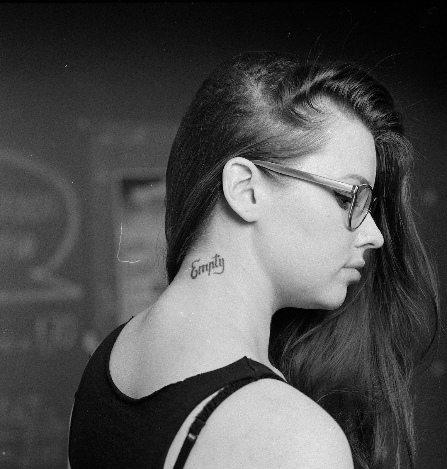 Profile portrait with glasses and swept hair