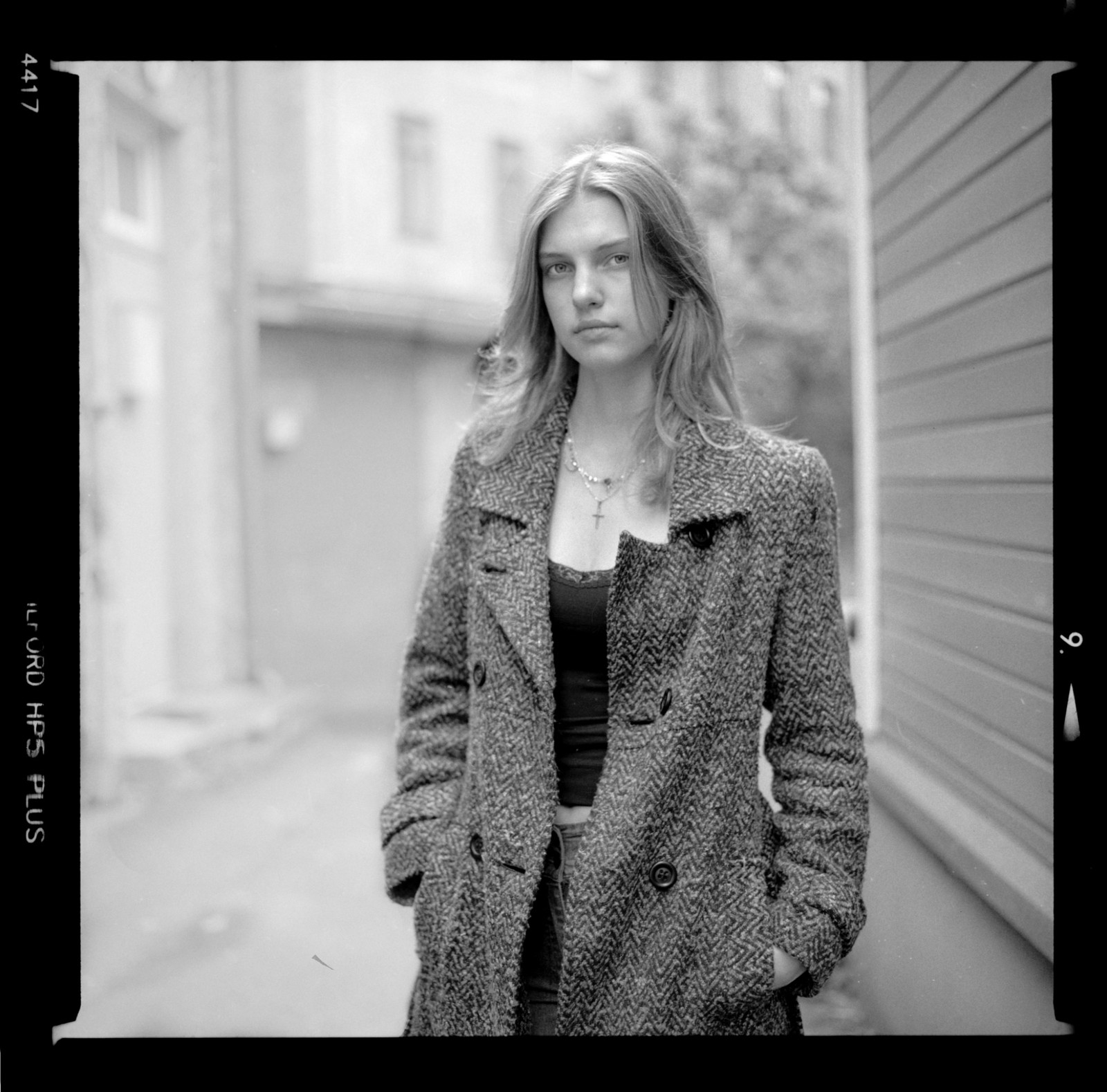 Outdoor portrait of a woman wearing a textured coat